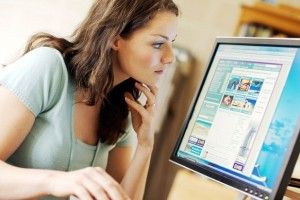 Woman looking for holiday on internet